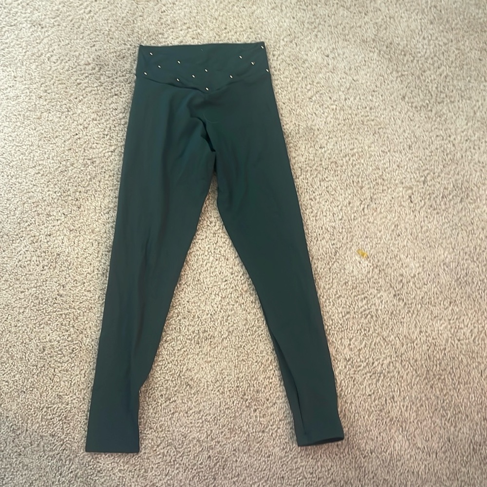 Dark green emerald colored Leggings with gold buttons on front and back